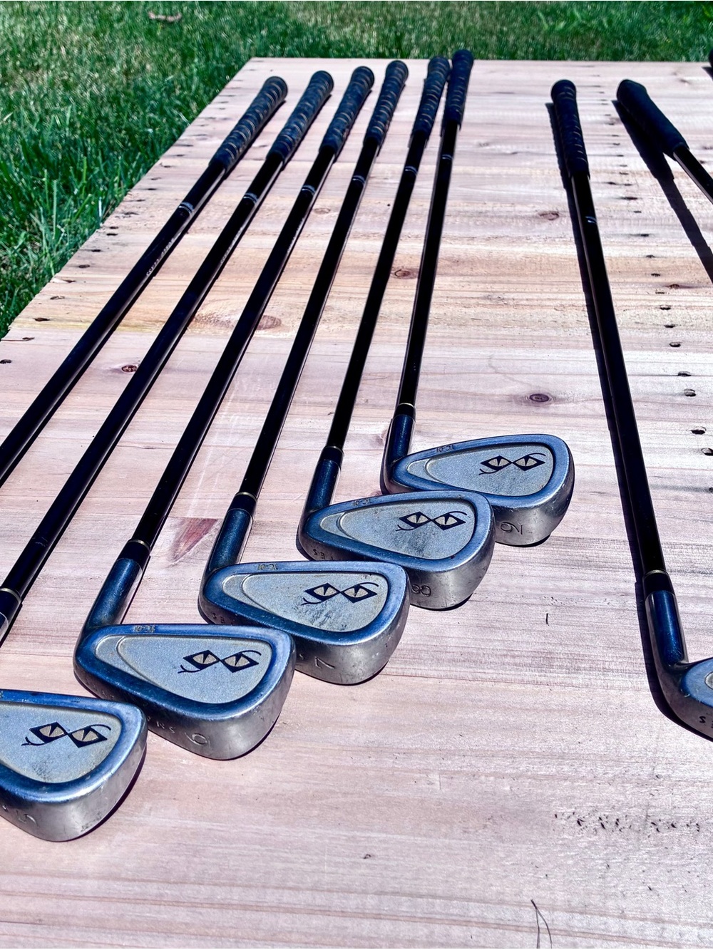 Full set Snake Eyes irons and woods.  Fenwick Graphite Shaft 6.0 with snake grip
